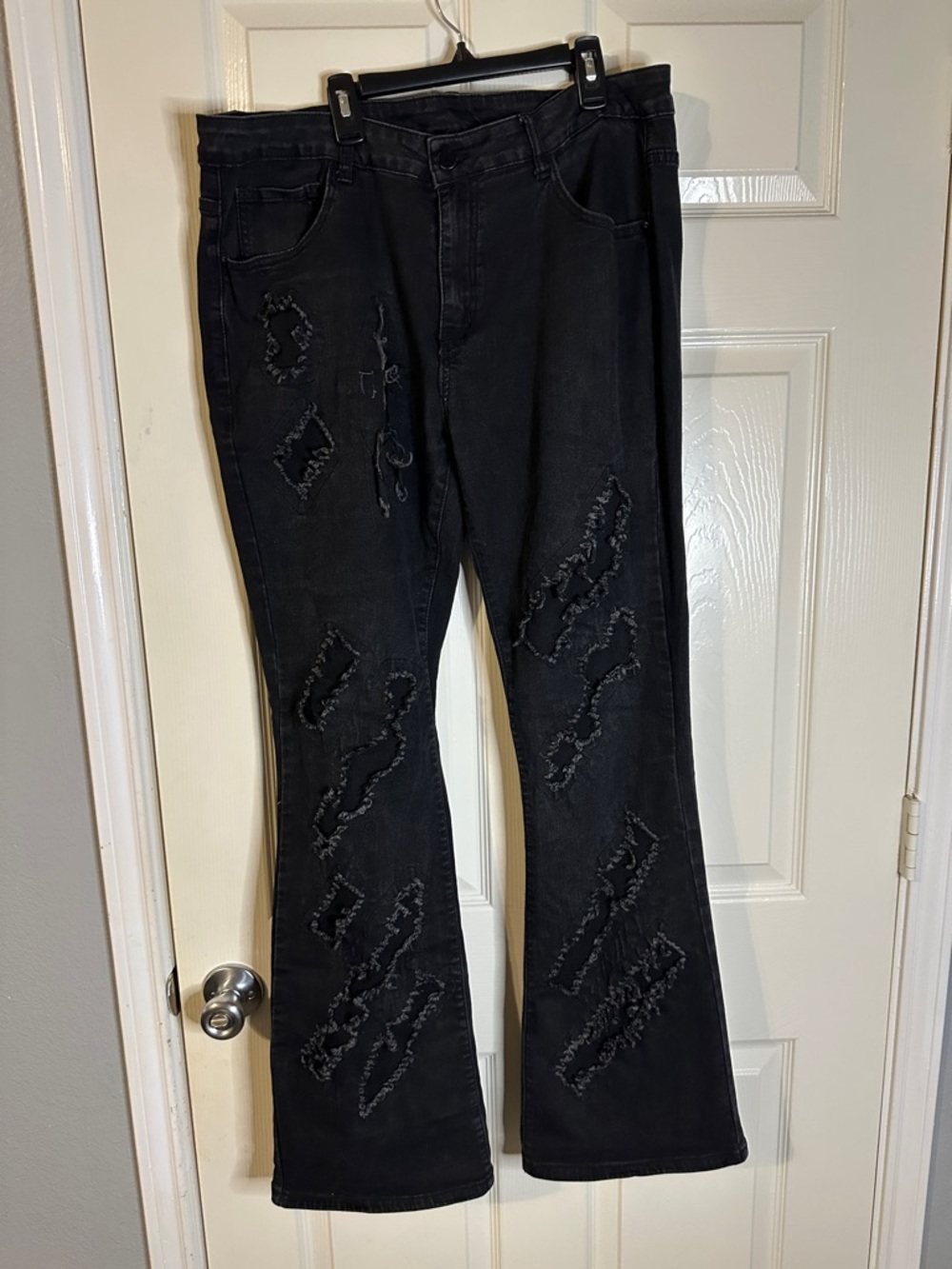 SHEIN Black Distressed Flare Jeans